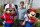 LAKE BUENA VISTA, FL - FEBRUARY 6:   In this handout image provided by Disney Parks, Super Bowl XLVI MVP and New York Giants quarterback Eli Manning poses with Mickey and Minnie Mouse on February 6, 2012 at the Magic Kingdom at Walt Disney World Resort in Lake Buena Vista, Florida.  Manning visited the theme park took place only one day after he led his team to a 21-17 victory over the New England Patriots in Super Bowl XLVI in Indianapolis.  Immediately following the game, Manning looked into TV cameras and shouted 'I'm Going to Disney World!'  He is the latest star in the famous Disney commercial series. (Photo by Gene Duncan/Disney Parks via Getty Images)