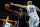 NEW ORLEANS, LA - JANUARY 18:  O.J. Mayo #32 of the Memphis Grizzlies shoots the ball around Chris Kaman #35 of the New Orleans Hornets at New Orleans Arena on January 18, 2012 in New Orleans, Louisiana.  NOTE TO USER: User expressly acknowledges and agrees that, by downloading and or using this photograph, User is consenting to the terms and conditions of the Getty Images License Agreement.  (Photo by Chris Graythen/Getty Images)