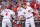 CINCINNATI, OH - SEPTEMBER 13: Brandon Phillips #4 and Joey Votto #19 of the Cincinnati Reds celebrate after Phillips hit a home run in the first inning against the Chicago Cubs at Great American Ball Park on September 13, 2011 in Cincinnati, Ohio. (Photo by Joe Robbins/Getty Images)