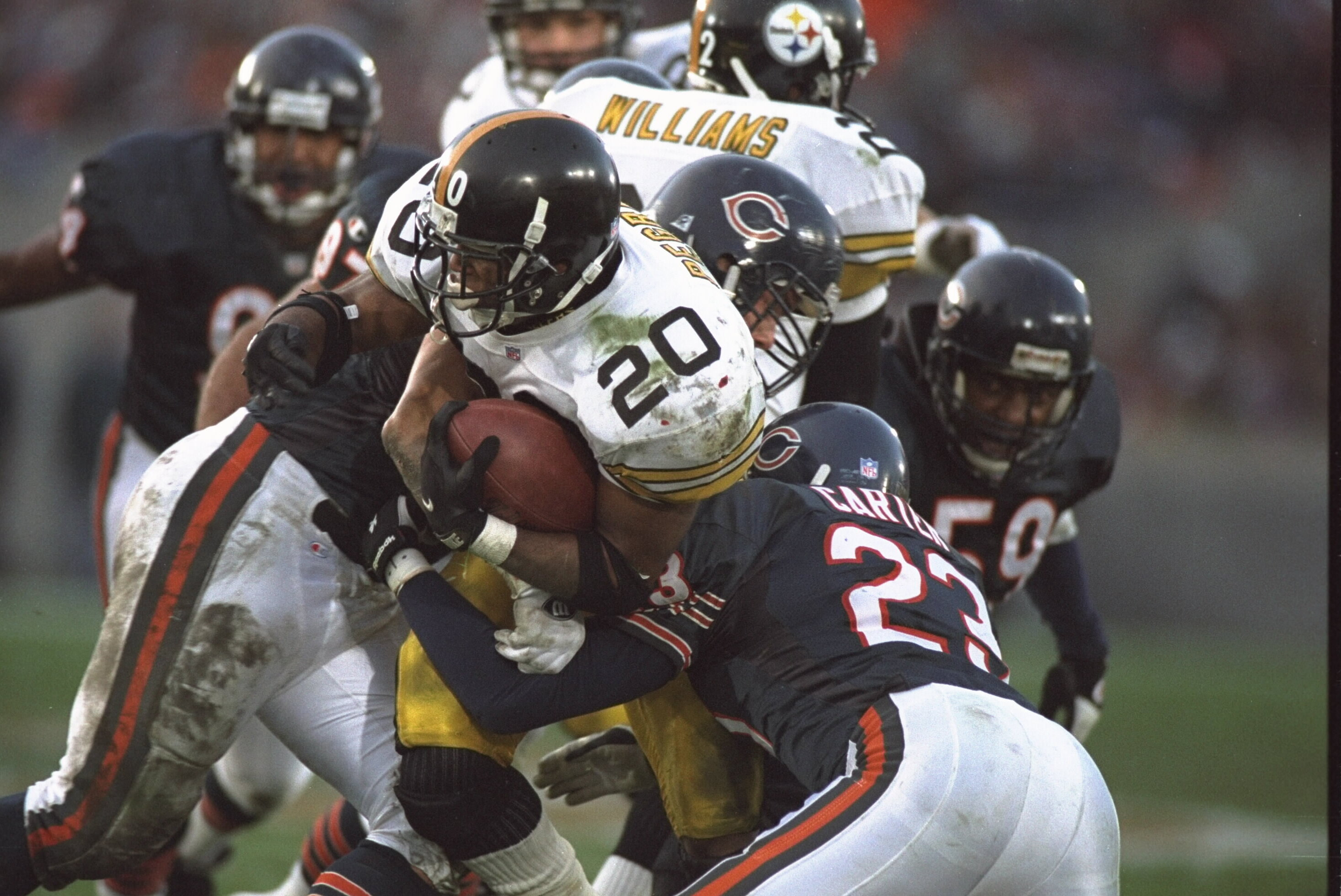 5 Nov 1995: Running back Eric Pegram #20 of the Pittsburgh Steelers is stopped by Safety Marty Carter of the Chicago Bears at Soldier Field in Chicago, Illinois. The Steelers defeated the Bears 37-34. Mandatory Credit: Jonathan Daniel/Allsport