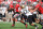 COLUMBUS, OH - SEPTEMBER 24:  Quarterback Braxton Miller #5 of the Ohio State Buckeyes can't elude the grasp of Josh Hartigan #17 of the Colorado Buffaloes in the first quarter at Ohio Stadium on September 24, 2011 in Columbus, Ohio.  (Photo by Jamie Sabau/Getty Images)
