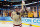 TAMPA, FL - APRIL 07:  Defenseman Tommy Cross #4 of the Boston College Eagles holds up the championship trophy after defeating the Ferris State Bulldogs during the NCAA Division 1 Men's Hockey Championship Game at the Tampa Bay Times Forum on April 7, 2012 in Tampa, Florida.  (Photo by J. Meric/Getty Images)