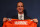 ENGLEWOOD, CO - MARCH 20:  Quarterback Peyton Manning poses with his uniform after the news conference announcing his contract with the Denver Broncos in the team meeting room at the Paul D. Bowlen Memorial Broncos Centre on March 20, 2012 in Englewood, Colorado. Manning, entering his 15th NFL season, was released by the Indianapolis Colts on March 7, 2012, where he had played his whole career. It has been reported that Manning will sign a five-year, $96 million offer.  (Photo by Doug Pensinger/Getty Images)