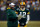 GREEN BAY, WI - JANUARY 15:  Head coach Mike McCarthy of the Green Bay Packers talks with  Aaron Rodgers #12 on the sidelines against the New York Giants during their NFC Divisional playoff game at Lambeau Field on January 15, 2012 in Green Bay, Wisconsin.  (Photo by Scott Boehm/Getty Images)