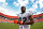 MIAMI GARDENS, FL - NOVEMBER 13:   Reggie Bush #22 of the Miami Dolphins jogs off the field after a game against the Washington Redskins at Sun Life Stadium on November 13, 2011 in Miami Gardens, Florida.  (Photo by Mike Ehrmann/Getty Images)