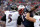 FOXBORO, MA - JANUARY 22:   Joe Flacco #5 of the Baltimore Ravens gets tackled by  Vince Wilfork #75 of the New England Patriots during their AFC Championship Game at Gillette Stadium on January 22, 2012 in Foxboro, Massachusetts.  (Photo by Jim Rogash/Getty Images)