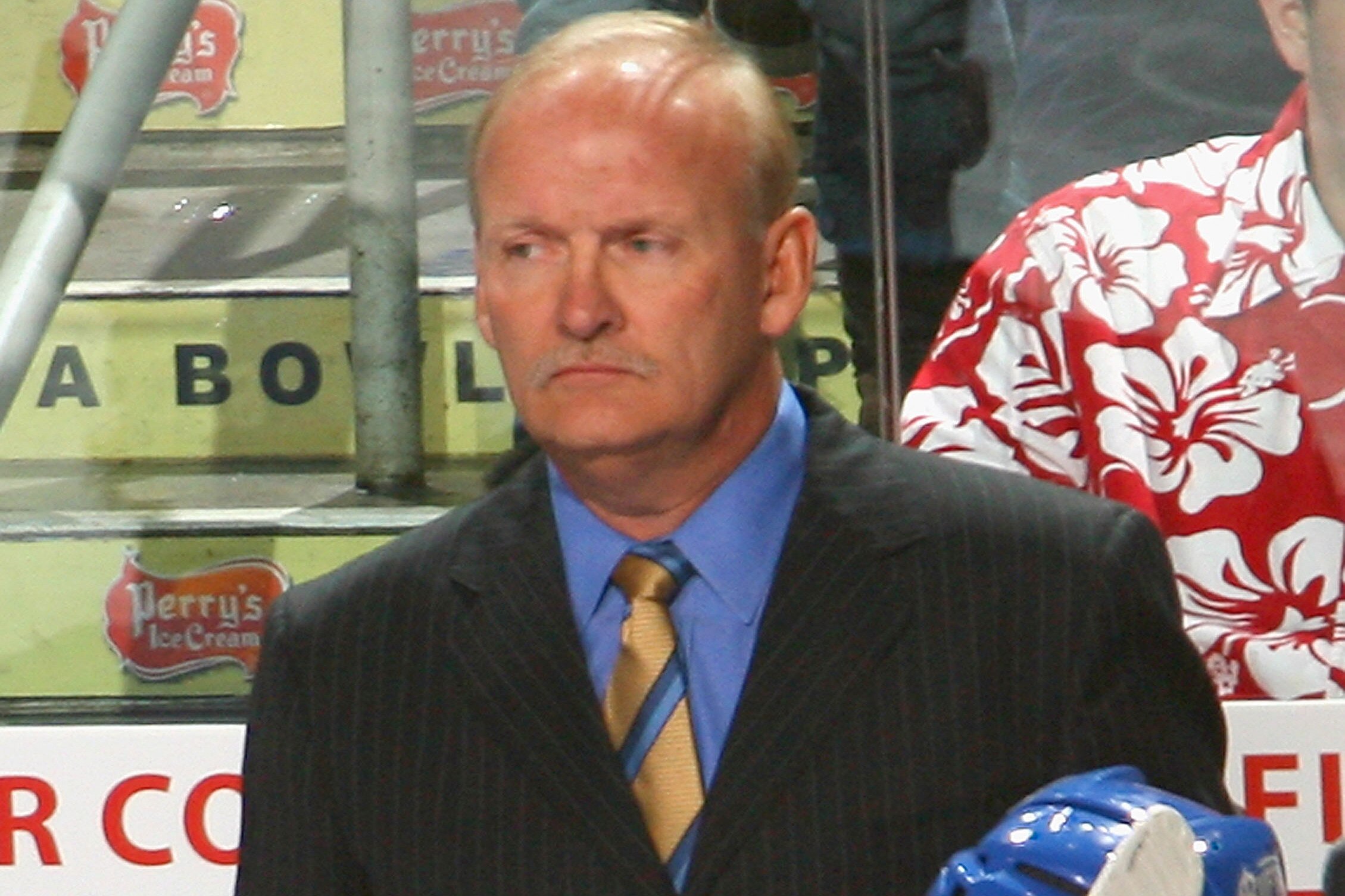 BUFFALO, NY - OCTOBER 09: Lindy Ruff, head coach of the Buffalo Sabres stands on the bench during a time out against the New York Rangers at HSBC Arena on October 9, 2010 in Buffalo, New York. New York won 6-3. (Photo by Rick Stewart/Getty Images)
