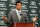 FLORHAM PARK, NJ - MARCH 26:  Quarterback Tim Tebow addresses the media as he is introduced as a New York Jet at the Atlantic Health Jets Training Center on March 26, 2012 in Florham Park, New Jersey. Tebow, traded from the Denver Broncos last week, will be the team's backup quarterback according to Jets head coach Rex Ryan. Tebow, the 2007 Heisman Trophy winner, started 11 games in 2011 for Denver and finished with a 7-4 record as a starter. He led the Broncos to a playoff overtime win against the Pittsburgh Steelers in the first round before eventually losing to the New England Patriots in the next round.  (Photo by Mike Stobe/Getty Images)