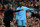 MANCHESTER, ENGLAND - OCTOBER 23:  Manchester City Manager Roberto Mancini gives instructions to Mario Balotelli during the Barclays Premier League match between Manchester United and Manchester City at Old Trafford on October 23, 2011 in Manchester, England.  (Photo by Laurence Griffiths/Getty Images)