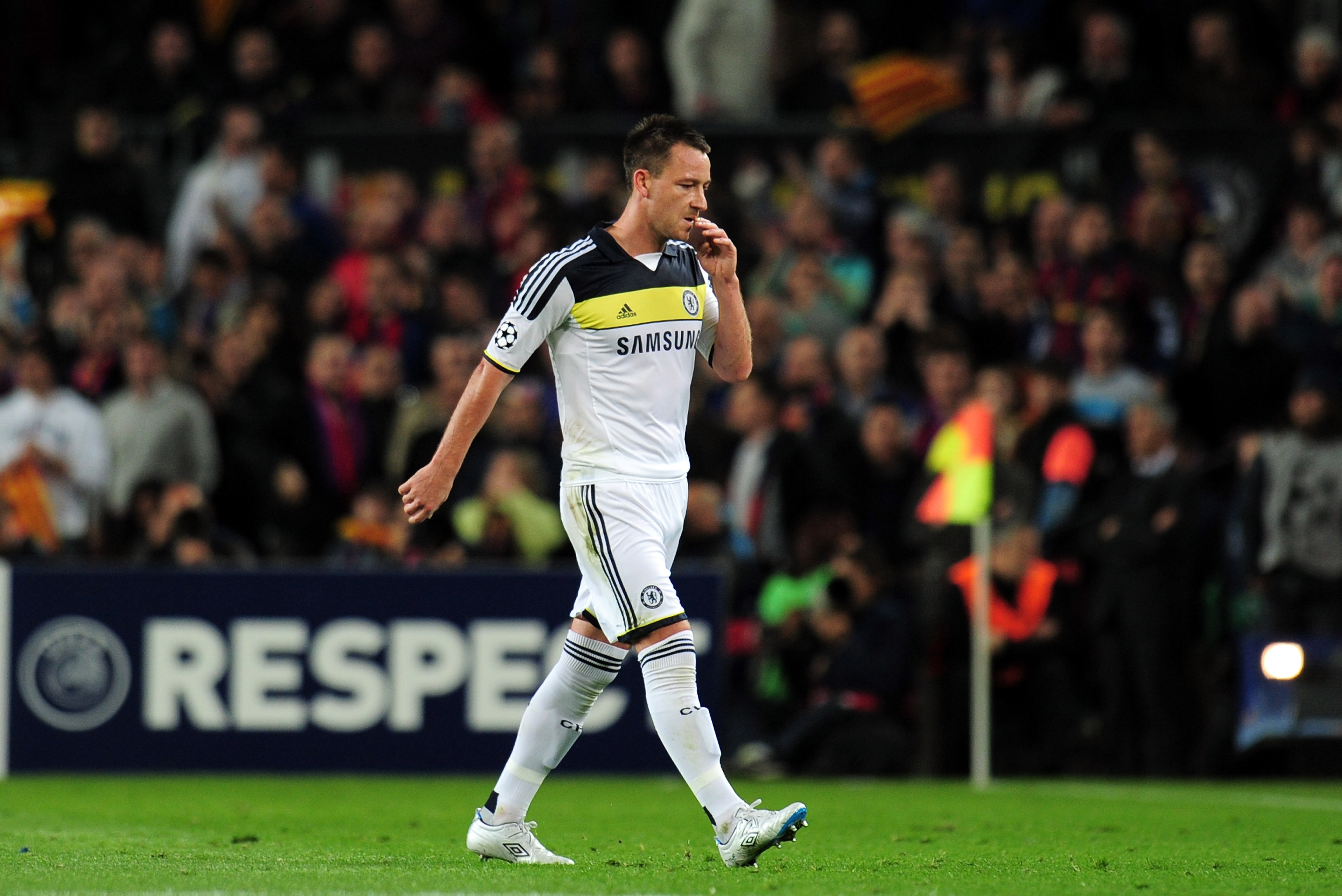 BARCELONA, SPAIN - APRIL 24: John Terry of Chelsea leaves the field after being shown a red card during the UEFA Champions League Semi Final, second leg match between FC Barcelona and Chelsea FC at Camp Nou on April 24, 2012 in Barcelona, Spain. (Photo by Shaun Botterill/Getty Images)