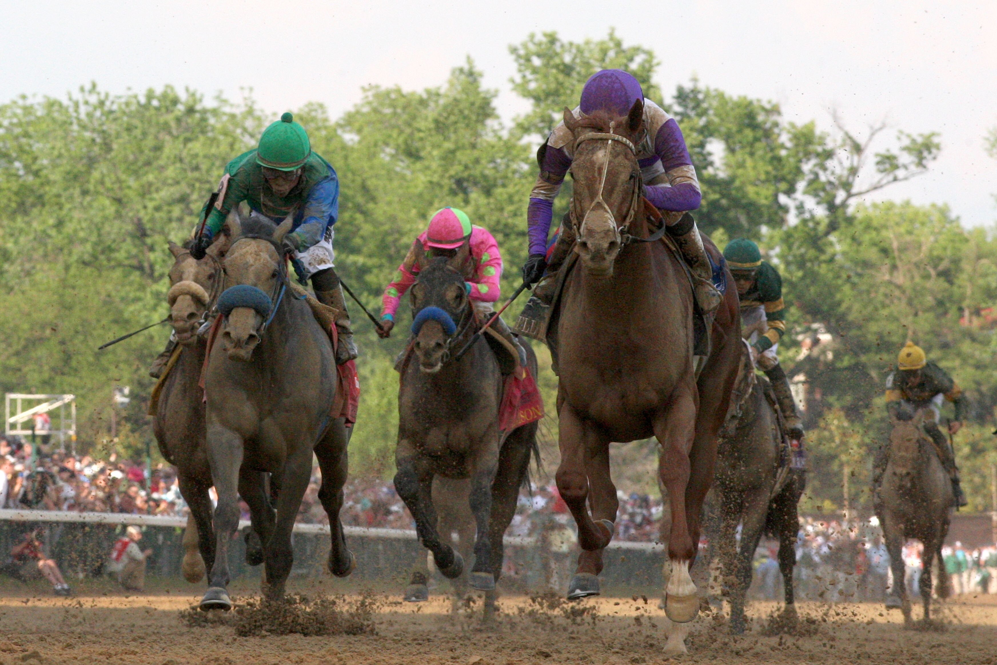 LOUISVILLE, KY - MAY 05:  I'll Have Another ridden by Mario Gutierrez leads the pack down the final stretch during the 138th running of the Kentucky Derby ahead of at Churchill Downs on May 5, 2012 in Louisville, Kentucky.  (Photo by Matthew Stockman/Getty Images)