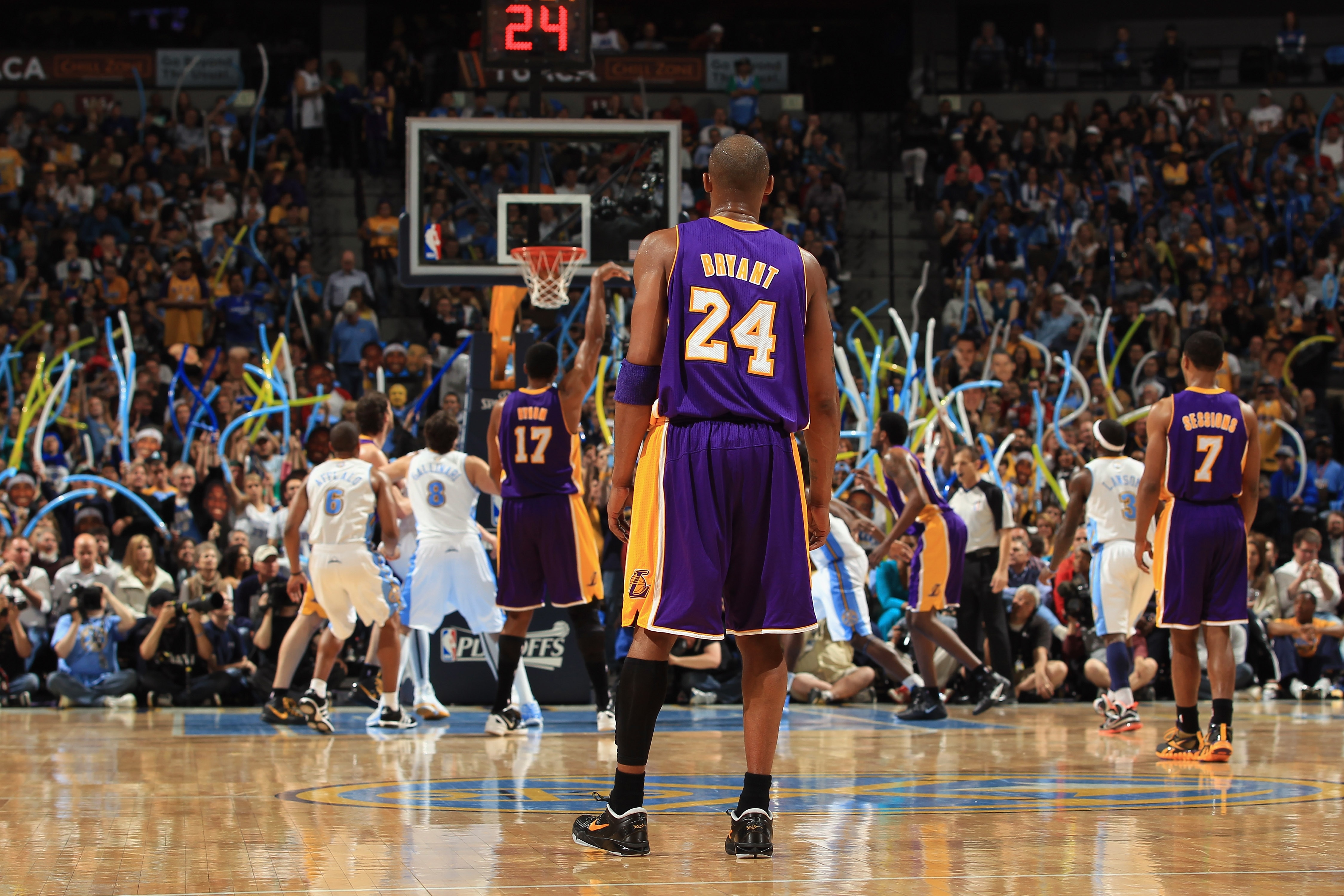 DENVER, CO - MAY 06: Kobe Bryant #24 of the Los Angeles Lakers watches as the Denver Nuggets fans distract Andrew Bynum #17 of the Los Angeles Lakers during a free throw in Game Four of the Western Conference Quarterfinals in the 2012 NBA Playoffs at Pepsi Center on May 6, 2012 in Denver, Colorado. The Lakers defeated the Nuggets 92-88 to take a 3-1 lead in the series. NOTE TO USER: User expressly acknowledges and agrees that, by downloading and or using this photograph, User is consenting to the terms and conditions of the Getty Images License Agreement. (Photo by Doug Pensinger/Getty Images)