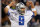 ARLINGTON, TX - DECEMBER 11:  Tony Romo #9 of the Dallas Cowboys celebrates after the Cowboys scored against the New York Giants in the fourth quarter at Cowboys Stadium on December 11, 2011 in Arlington, Texas.  (Photo by Tom Pennington/Getty Images)
