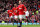 MANCHESTER, ENGLAND - APRIL 15:  Wayne Rooney of Manchester United celebrates scoring the opening goal during the Barclays Premier League match between Manchester United and Aston Villa at Old Trafford on April 15, 2012 in Manchester, England.  (Photo by Alex Livesey/Getty Images)