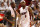 MIAMI, FL - MAY 09:  Forward LeBron James #6 (L) and Guard Dwyane Wade #3 of the Miami Heat chat against the New York Knicks in Game Five of the Eastern Conference Quarterfinals in the 2012 NBA Playoffs  on May 9, 2012 at the American Airines Arena in Miami, Florida. Miami defeated the Knicks 106-94 to advance to the next round four games to one.  NOTE TO USER: User expressly acknowledges and agrees that, by downloading and or using this photograph, User is consenting to the terms and conditions of the Getty Images License Agreement.  (Photo by Marc Serota/Getty Images)