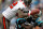 CHARLOTTE, NC - DECEMBER 24:  Kellen Winslow #82 of the Tampa Bay Buccaneers fumbles the ball as teammates Dan Connor #55 and Chris Gamble #20 of the Carolina Panthers make a play on the ball during their game at Bank of America Stadium on December 24, 2011 in Charlotte, North Carolina.  (Photo by Streeter Lecka/Getty Images)