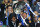 MUNICH, GERMANY - MAY 19:  Club owner Roman Abramovich (R) lifts the trophy in celebration while  Chancellor of the Exchequer George Osborne (C) applauds after their victory in the UEFA Champions League Final between FC Bayern Muenchen and Chelsea at the Fussball Arena München on May 19, 2012 in Munich, Germany.  (Photo by Alex Livesey/Getty Images)