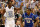 GREENSBORO, NC - MARCH 18:  Harrison Barnes #40 of the North Carolina Tar Heels reacts as he runs down court next to Jahenns Manigat #12 of the Creighton Bluejays in the first half during the third round of the 2012 NCAA Men's Basketball Tournament at Greensboro Coliseum on March 18, 2012 in Greensboro, North Carolina.  (Photo by Streeter Lecka/Getty Images)