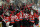 NEWARK, NJ - MAY 25:  The New Jersey Devils celebrate after the game winning goal by Adam Henrique #14 in overtime as Henrik Lundqvist #30 and Dan Girardi #5 of the New York Rangers of the New York Rangers looks on during Game Six of the Eastern Conference Final and advance to the 2012 NHL Stanley Cup Final at the Prudential Center on May 25, 2012 in Newark, New Jersey.  (Photo by Jim McIsaac/Getty Images)
