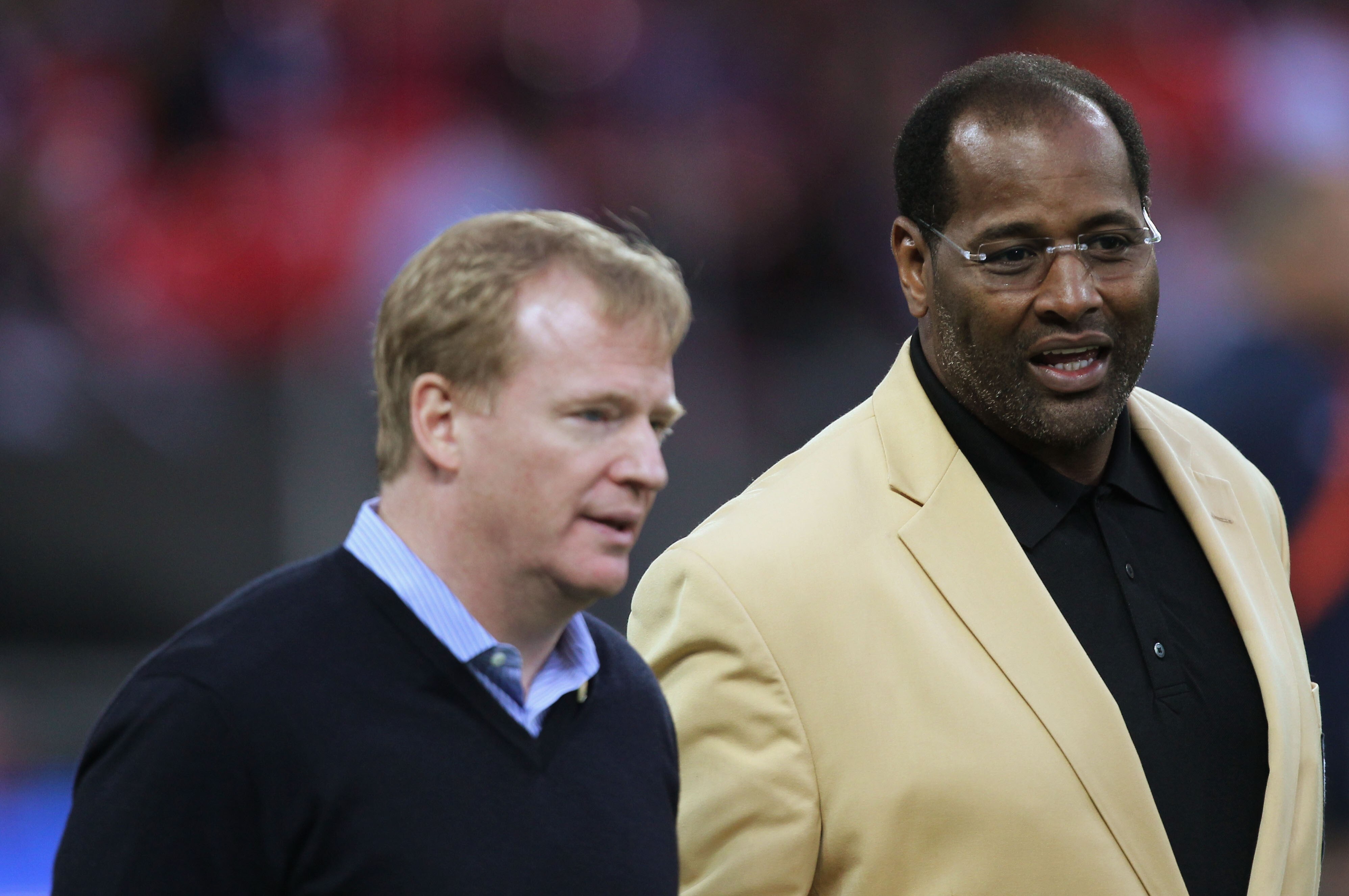 LONDON, ENGLAND - OCTOBER 23: Former Chicago Bears player Richard Dent talks to NFL Commissioner Roger Goodell prior to the NFL International Series match between Chicago Bears and Tampa Bay Buccaneers at Wembley Stadium on October 23, 2011 in London, England. This is the fifth occasion where a regular season NFL match has been played in London. (Photo by Streeter Lecka/Getty Images)