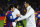 BARCELONA, SPAIN - JANUARY 25:  Lionel Messi of FC Barcelona (L) shakes hands with Cristiano Ronaldo of Real Madrid prior to the Copa del Rey quarter final second leg match between FC Barcelona and Real Madrid at Camp Nou on January 25, 2012 in Barcelona, Spain.  (Photo by David Ramos/Getty Images)