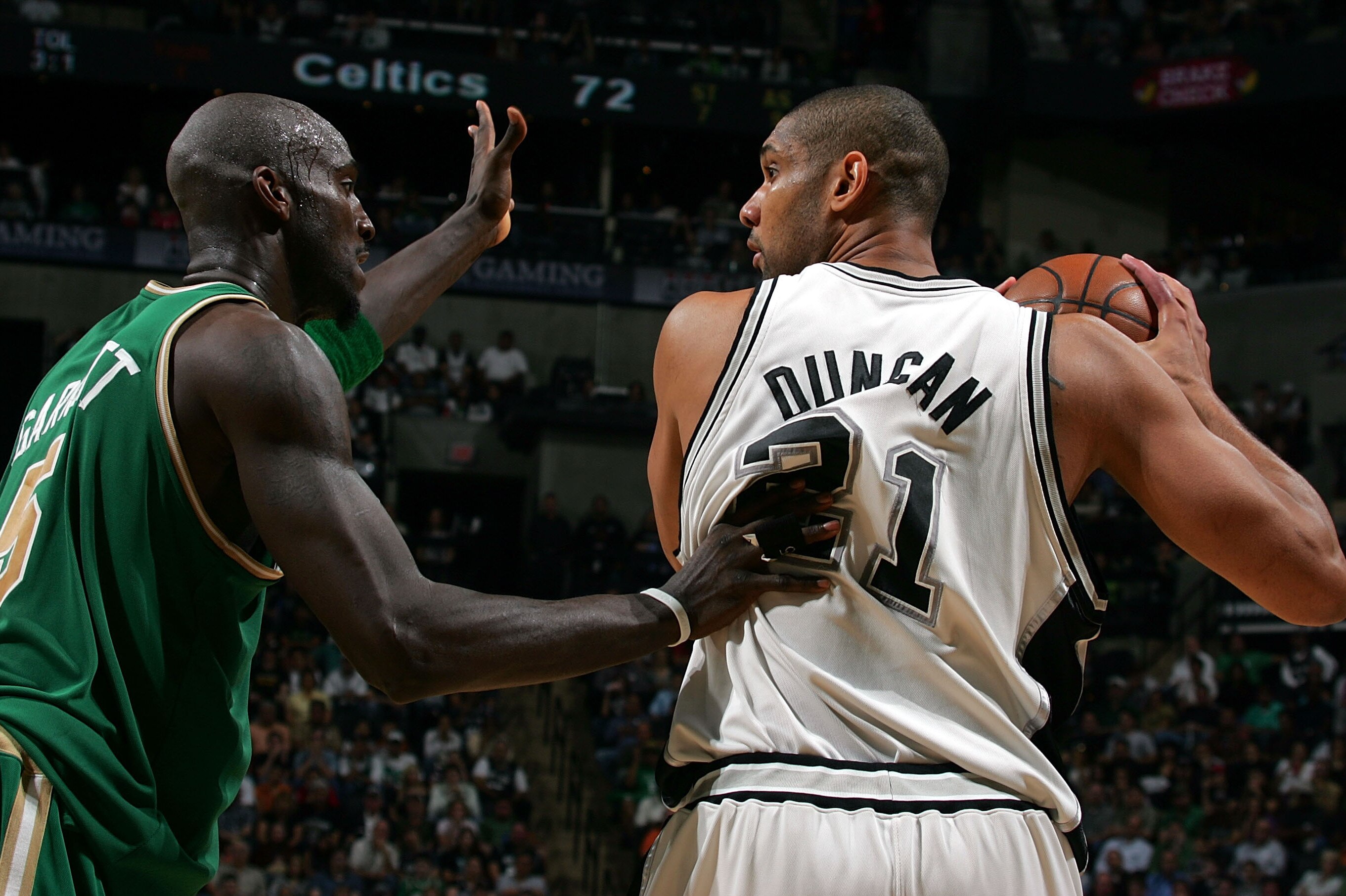 Kevin Garnett and Tim Duncan will be facing off for three more seasons.