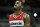 WASHINGTON, DC - FEBRUARY 22: John Wall #2 of the Washington Wizards looks on during the closing moments of Wizards 115-107 loss to the Sacramento Kings at Verizon Center on February 22, 2012 in Washington, DC. NOTE TO USER: User expressly acknowledges and agrees that, by downloading and or using this photograph, User is consenting to the terms and conditions of the Getty Images License Agreement. (Photo by Rob Carr/Getty Images)