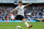 LONDON, ENGLAND - APRIL 01:  Luka Modric of Spurs takes a shot during the Barclays Premier League match between Tottenham Hotspur and Swansea City at White Hart Lane on April 1, 2012 in London, England.  (Photo by Mike Hewitt/Getty Images)