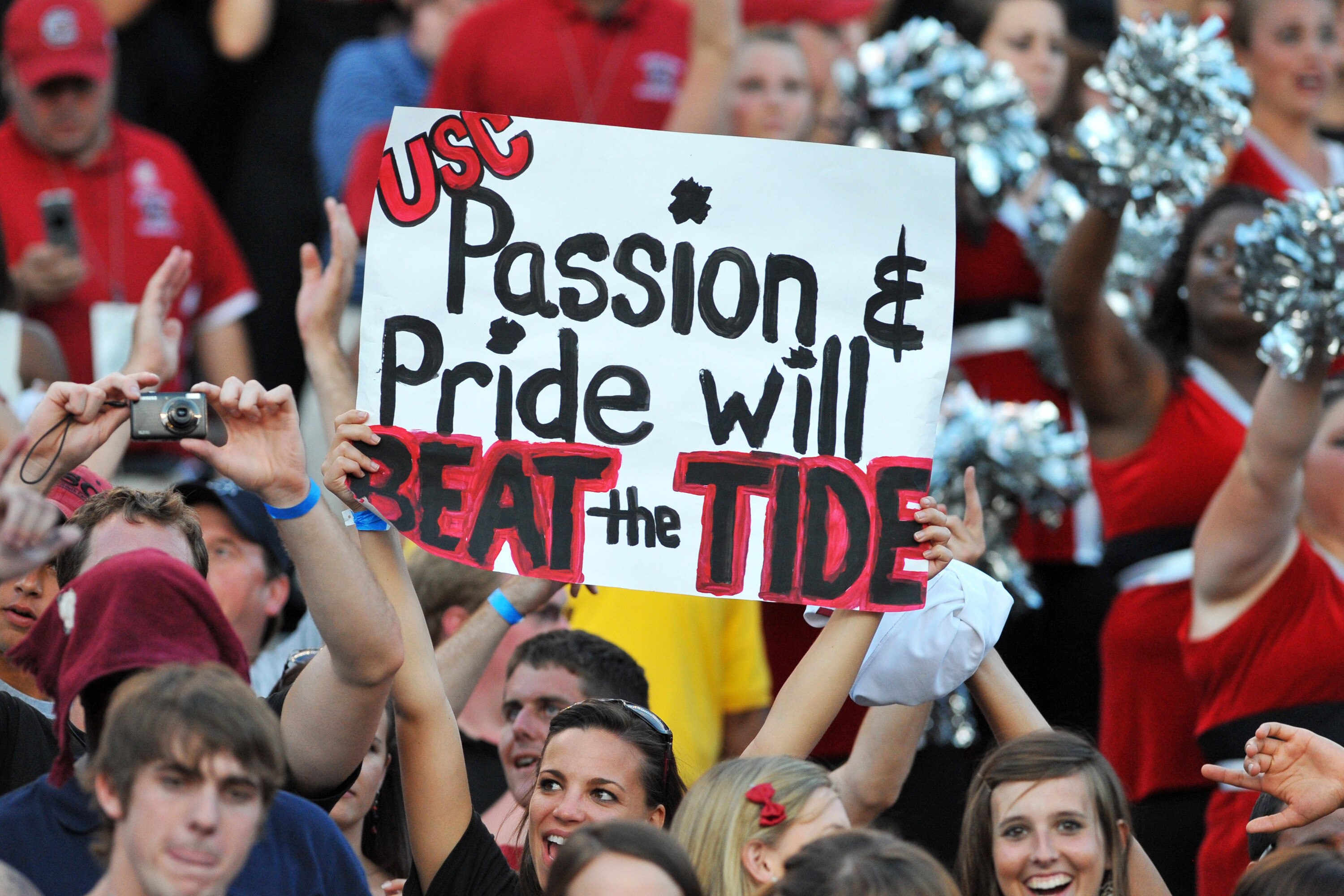 COLUMBIA, SC - OCTOBER 9: Fans of the South Carolina Gamecocks cheer a victory against the Alabama Crimson Tide October 9, 2010 at Williams-Brice Stadium in Columbia, South Carolina. (Photo by Al Messerschmidt/Getty Images)