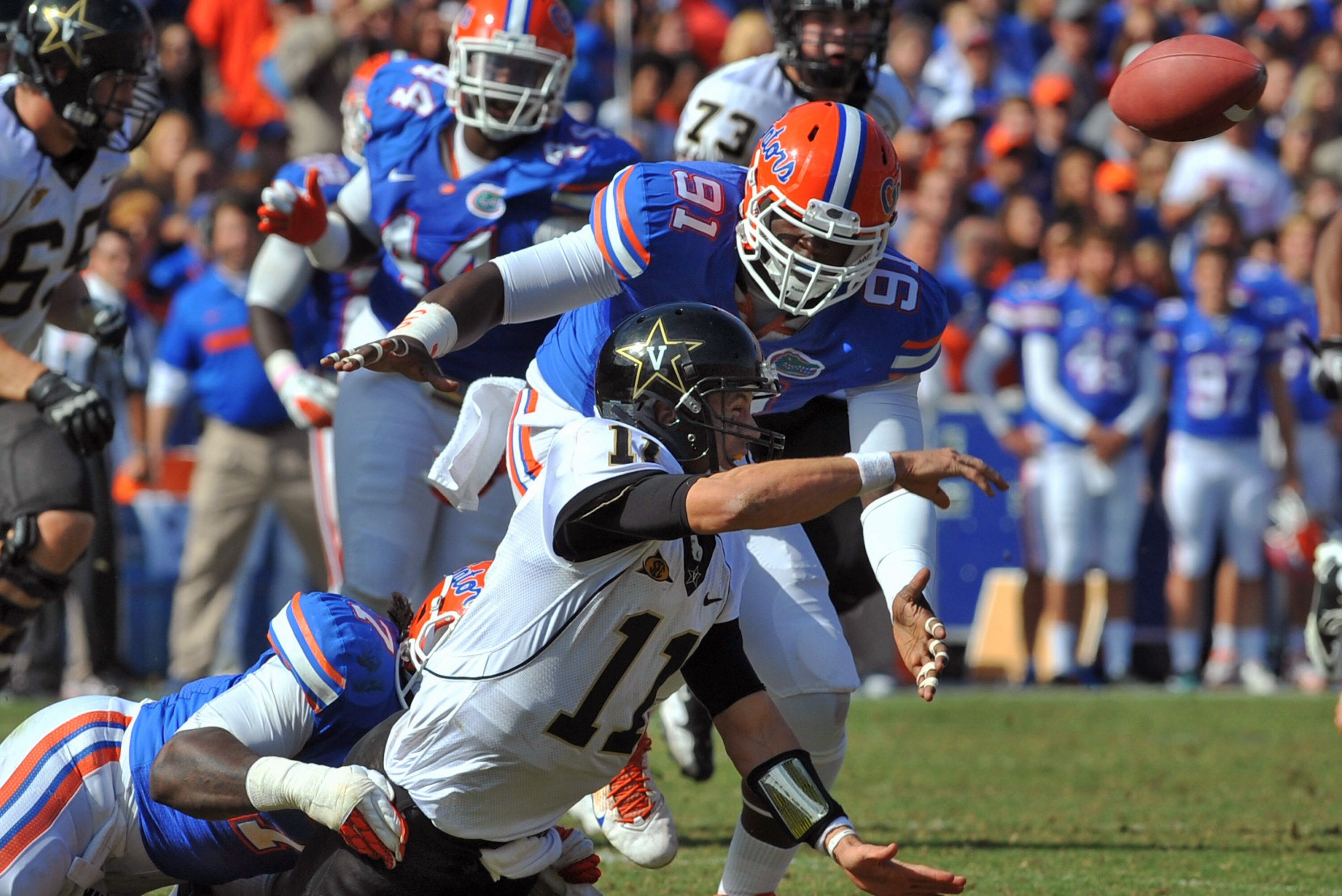 GAINESVILLE, FL - NOVEMBER 5: Quarterback Jordan Rodgers #11 of the Vanderbilt Commodores forces a pass against the Florida Gators November 5, 2011 at Ben Hill Griffin Stadium in Gainesville, Florida. Rodgers was penalized. (Photo by Al Messerschmidt/Getty Images)