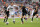 MADRID, SPAIN - SEPTEMBER 02:  Cristiano Ronaldo of Real Madrid competes for the ball with Guilherme M. Siqueira of Granada during the La Liga match between Real Madrid and Granada at Estadio Santiago Bernabeu on September 2, 2012 in Madrid, Spain.  (Photo by Gonzalo Arroyo Moreno/Getty Images)