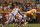KNOXVILLE, TN - SEPTEMBER 15: Justin Hunter # 11 of the Tennessee Volunteers is tackled by Jonathan Bostic #1 and and Antonio Morrison #12 of the Florida Gators during the second half of play at Neyland Stadium on September 15, 2012 in Knoxville, Tennessee.    (Photo by John Sommers II/Getty Images)
