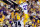 BATON ROUGE, LA - SEPTEMBER 08: Josh Williford #74 and Kenny Hilliard #27 of the LSU Tigers celebrate a touchdown against the Washington Huskies at Tiger Stadium on September 8, 2012 in Baton Rouge, Louisiana. (Photo by Stacy Revere/Getty Images)