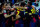SEVILLE, SPAIN - SEPTEMBER 29:  Players of FC Barcelona celebrate with David Villa and teammates Leo Messi and Cristian Tello scoring their third goal during the La Liga match between Sevilla FC and FC Barcelona at Estadio Ramon Sanchez Pizjuan on September 29, 2012 in Seville, Spain.  (Photo by Gonzalo Arroyo Moreno/Getty Images)