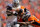 DENVER, CO - SEPTEMBER 30:  Running back Darren McFadden #20 of the Oakland Raiders is tackled for a loss by defensive tackle Derek Wolfe #95 and linebacker Wesley Woodyard #52 of the Denver Broncos defense at Sports Authority Field Field at Mile High on September 30, 2012 in Denver, Colorado. (Photo by Justin Edmonds/Getty Images)