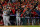 WASHINGTON, DC - OCTOBER 12:  (L) Catcher Yadier Molina #4 of the St. Louis Cardinals and the rest of the dugout reacts in the ninth inning after the Cardinals take the lead against the Washington Nationals in Game Five of the National League Division Series at Nationals Park on October 12, 2012 in Washington, DC.  (Photo by Rob Carr/Getty Images)