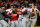 WASHINGTON, DC - OCTOBER 12:  Jason Motte #30 of the St. Louis Cardinals celebrates with teammates after the Cardinals defeat the Washington Nationals 9-7 in Game Five of the National League Division Series at Nationals Park on October 12, 2012 in Washington, DC.  (Photo by Rob Carr/Getty Images)