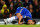 LONDON, ENGLAND - NOVEMBER 11:  John Terry of Chelsea is injured in a collision with Luis Suarez of Liverpool during the Barclays Premier League match between Chelsea and Liverpool at Stamford Bridge on November 11, 2012 in London, England.  (Photo by Clive Rose/Getty Images)