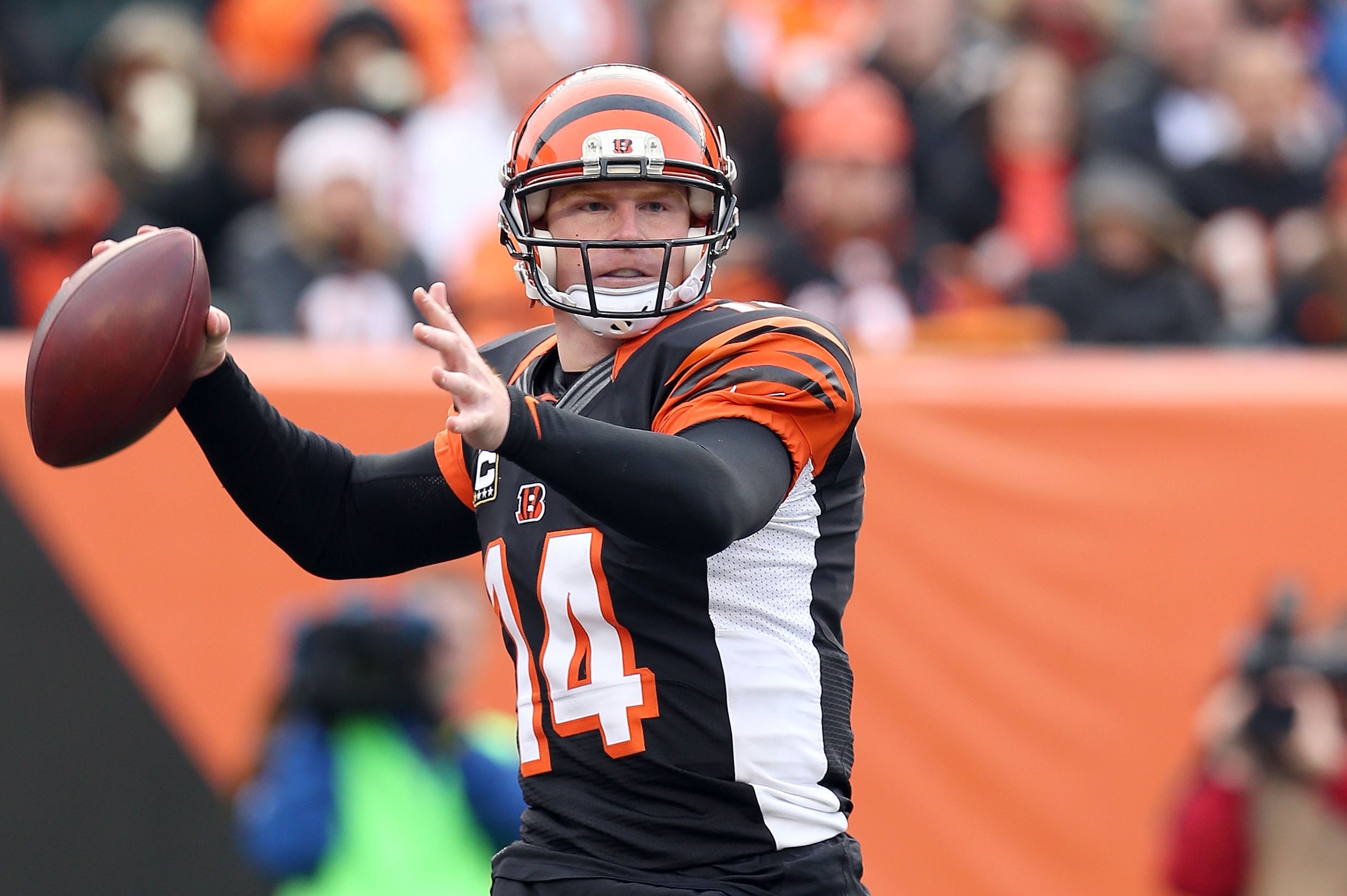 CINCINNATI, OH - NOVEMBER 25: Andy Dalton #14 of the Cincinnati Bengals throws a pass during the NFL game against the Oakland Raiders at Paul Brown Stadium on November 25, 2012 in Cincinnati, Ohio. (Photo by Andy Lyons/Getty Images)