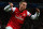 LONDON, ENGLAND - NOVEMBER 21:  Lukas Podolski of Arsenal scores their second goal during the UEFA Champions League group B match between Arsenal FC and Montpellier Herault SC at Emirates Stadium on November 21, 2012 in London, England.  (Photo by Mike Hewitt/Getty Images)