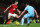 MANCHESTER, ENGLAND - NOVEMBER 28:  Robin van Persie of Manchester United takes on Winston Reid of West Ham United during the Barclays Premier League match between Manchester United and West Ham United at Old Trafford on November 28, 2012 in Manchester, England.  (Photo by Clive Brunskill/Getty Images)