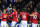 READING, ENGLAND - DECEMBER 01:  Robin van Persie of Manchester United celebrates scoring a goal with teammates Chris Smalling, Michael Carrick and Wayne Rooney during the Barclays Premier League match between Reading and Manchester United at Madejski Stadium on December 1, 2012 in Reading, England.  (Photo by Michael Regan/Getty Images)