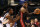 DALLAS, TX - DECEMBER 20:  LeBron James #6 of the Miami Heat dribbles the ball against Jae Crowder #9 of the Dallas Mavericks at American Airlines Center on December 20, 2012 in Dallas, Texas.  NOTE TO USER: User expressly acknowledges and agrees that, by downloading and or using this photograph, User is consenting to the terms and conditions of the Getty Images License Agreement.  (Photo by Ronald Martinez/Getty Images)