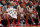COLUMBUS, OH - DECEMBER 22:  From left to right, Amir Williams #23, Sam Thompson #12 and Evan Ravenel #30, all of the Ohio State Buckeyes, watch as the clock winds down in the Buckeyes' 74-66 loss to the Kansas Jayhawks on December 22, 2012 at Value City Arena in Columbus, Ohio.  (Photo by Jamie Sabau/Getty Images)