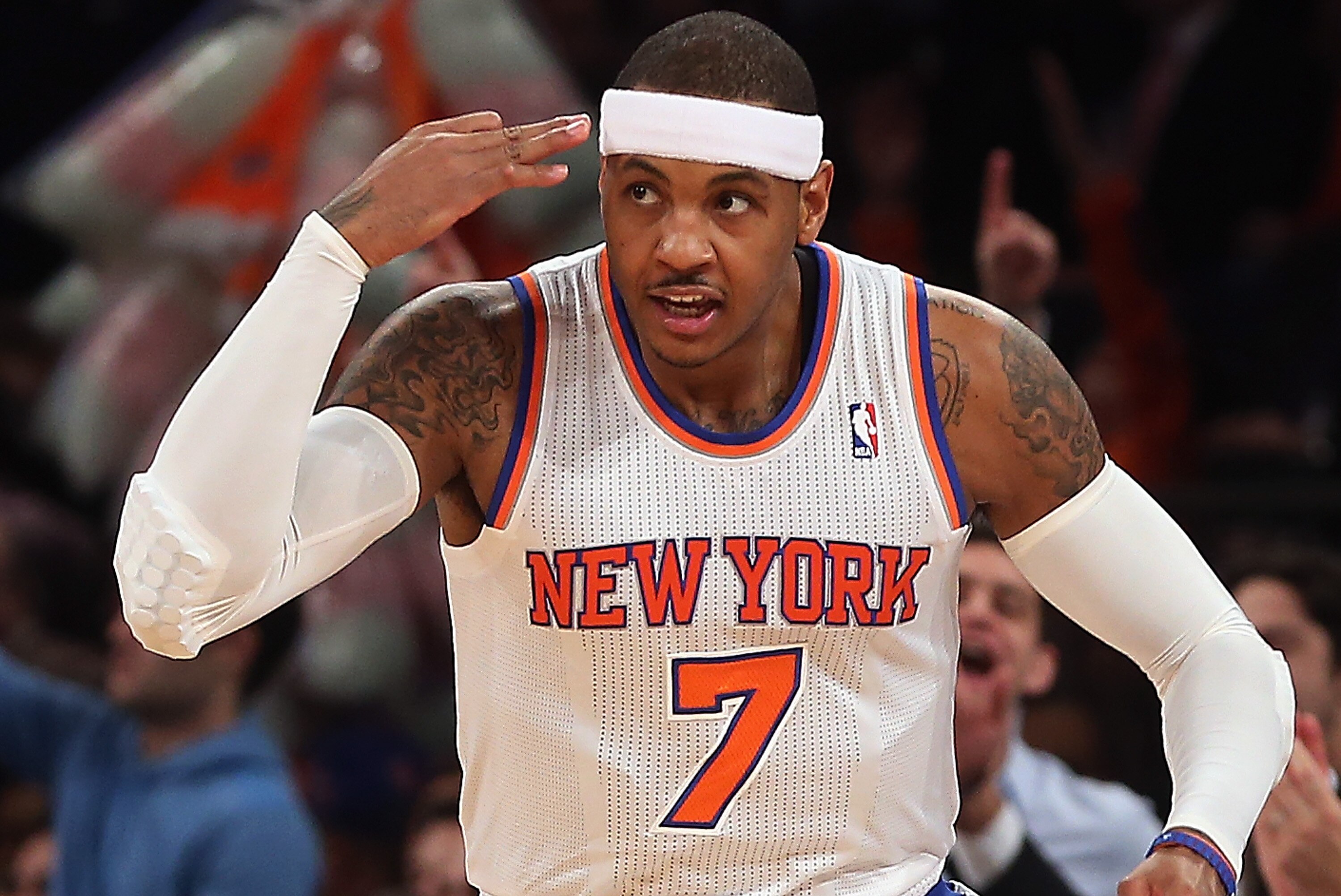 NEW YORK, NY - DECEMBER 13: Carmelo Anthony #7 of the New York Knicks sinks a three pointer against the Los Angeles Lakers in the first quarter at Madison Square Garden on December 13, 2012 in New York City. NOTE TO USER: User expressly acknowledges and agrees that, by downloading and/or using this photograph, user is consenting to the terms and conditions of the Getty Images License Agreement. (Photo by Bruce Bennett/Getty Images)
