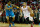 HOUSTON, TX - JANUARY 02:  Jeremy Lin #7 of the Houston Rockets drives past Roger Mason Jr. #8 of the New Orleans Hornets at Toyota Center on January 2, 2013 in Houston, Texas.  NOTE TO USER: User expressly acknowledges and agrees that, by downloading and or using this photograph, User is consenting to the terms and conditions of the Getty Images License Agreement.  (Photo by Scott Halleran/Getty Images)