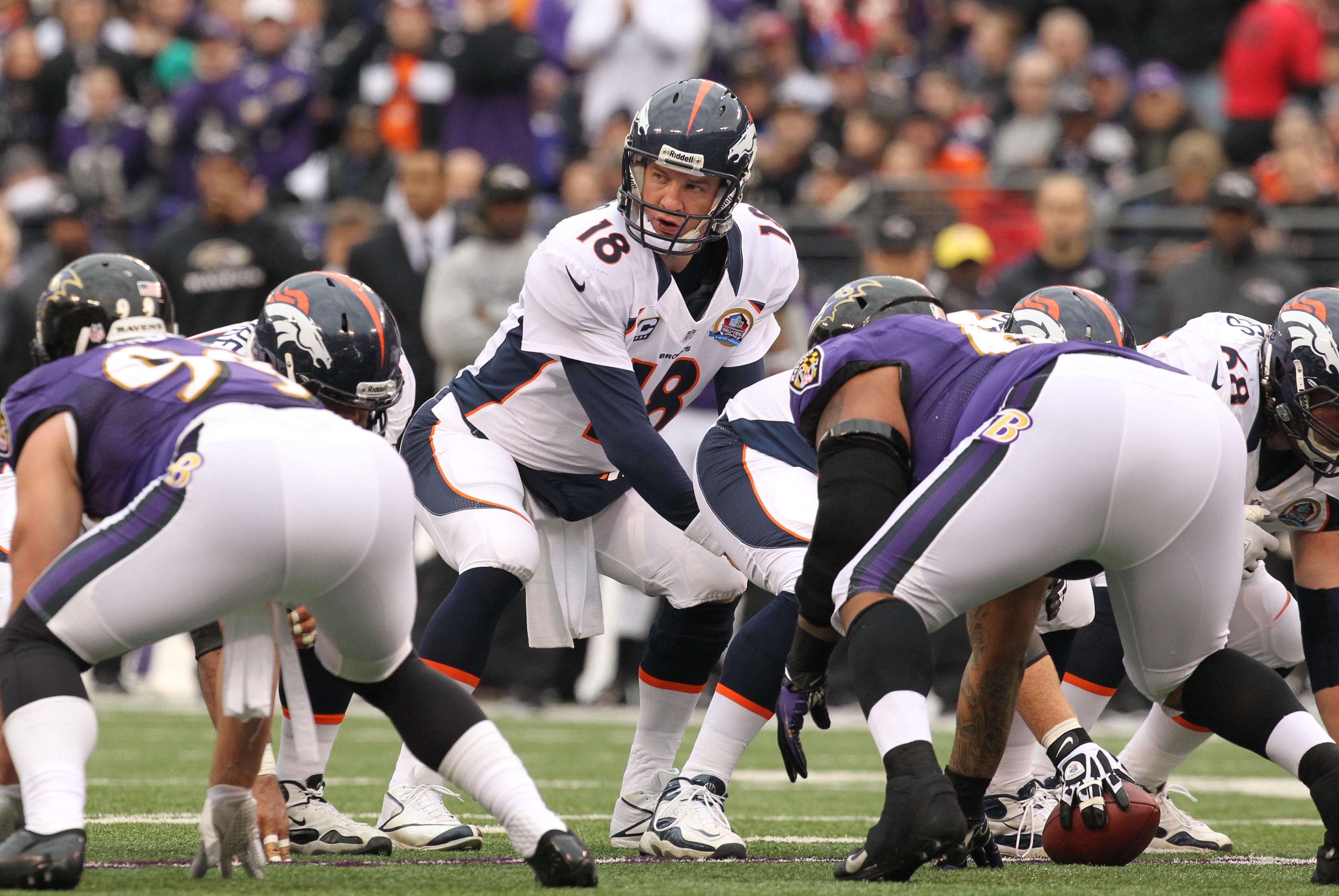 Dec 16, 2012; Baltimore, MD, USA; Denver Broncos quarterback Peyton Manning (18) directs the offense against the Baltimore Ravens at M&T Bank Stadium. Mandatory Credit: Mitch Stringer-USA TODAY Sports