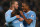 Michael Johnson is congratulated by former Manchester City teammates Vincent Kompany and Shaun Wright-Phillips after his goal against Scunthorpe in October 2009.