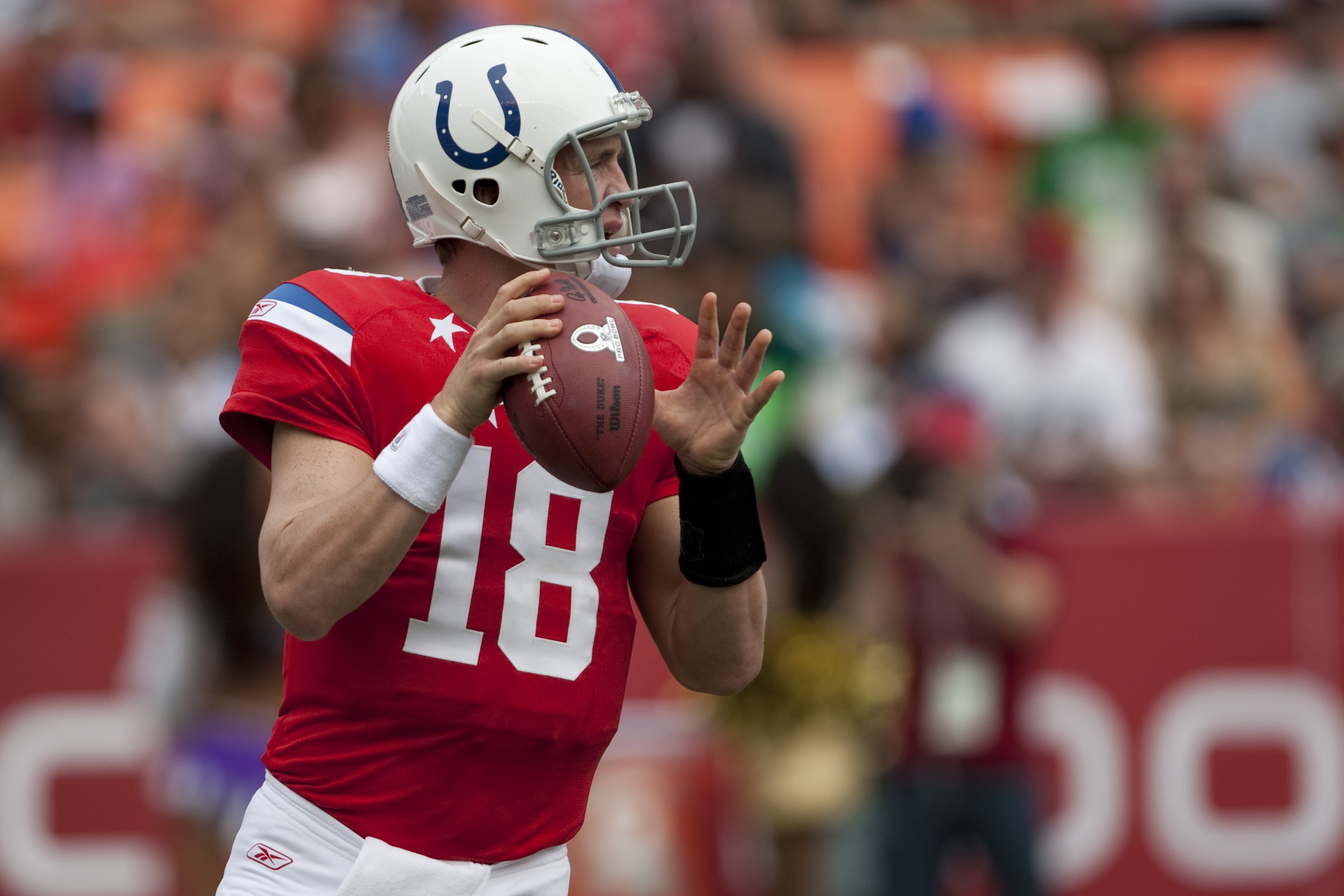 HONOLULU - JANUARY 30: Peyton Manning, #18 of the Indianapolis Colts, passes against the NFC team during the 2011 NFL Pro Bowl at Aloha Stadium on January 30, 2011 in Honolulu, Hawaii. (Photo by Kent Nishimura/Getty Images)