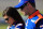 FORT WORTH, TX - NOVEMBER 03:  Danica Patrick, driver of the #7 Sega Sonic the Hedgehog/GoDaddy.com Chevrolet, and Ricky Stenhouse Jr., driver of the #6 NOS Energy Drink Ford, talk on the grid during qualifying for the NASCAR Nationwide Series O'Reilly Auto Parts Challenge at Texas Motor Speedway on November 3, 2012 in Fort Worth, Texas.  (Photo by Ronald Martinez/Getty Images)